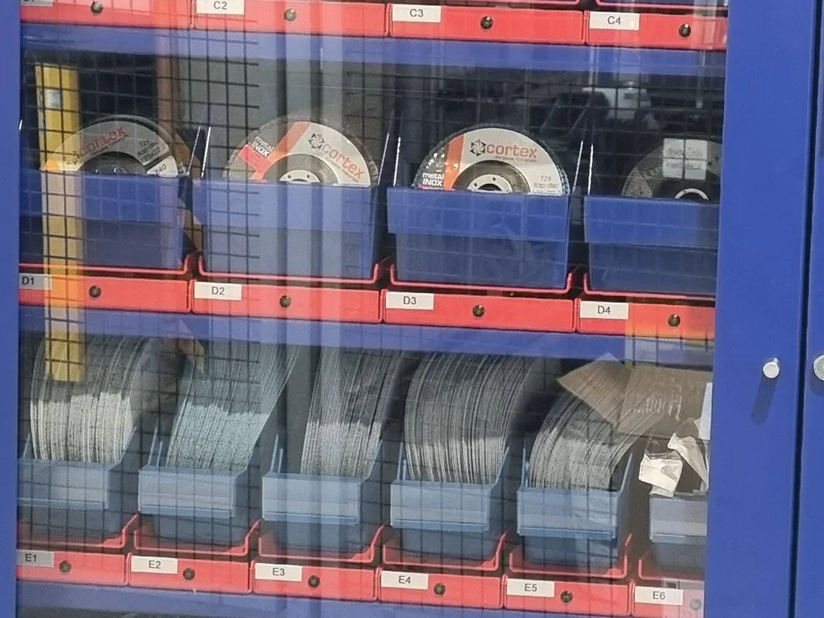Cutting and grinding discs standing in bins in an Inostorage cabinet